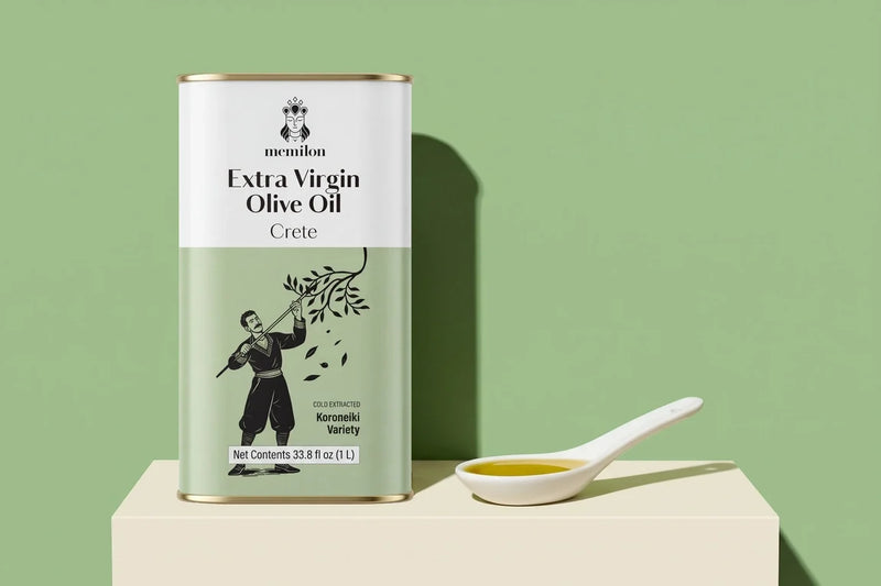 Is olive oil healthy? Memilon Crete extra virgin olive oil tin next to a spoon of olive oil